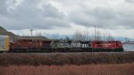 CP 8201, 6644 and 8637 slowing to a stop before the Kennedy road crossing, E/B.